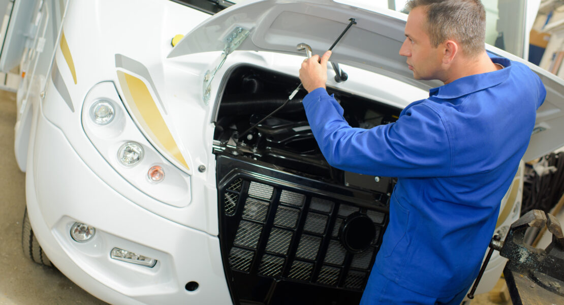 Man fixing motorhome